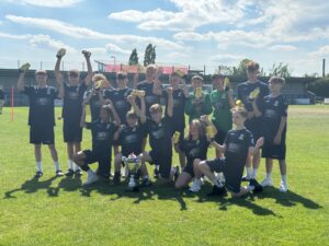 St Neots Town and JB1 celebrating winning ther junior premier league